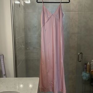 Midi length pink satin dress with rhinestones
